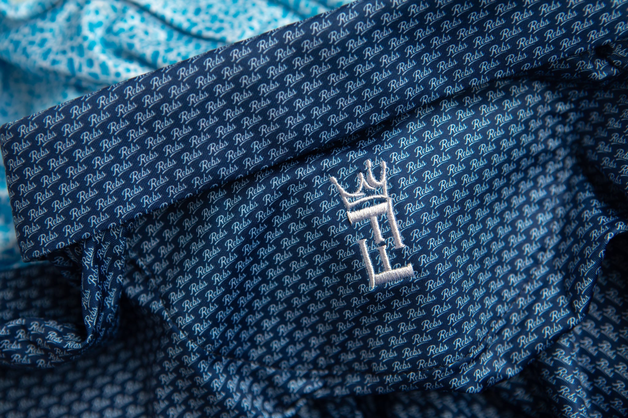 Navy Script polo by Fore Horsemen, embroidered logo