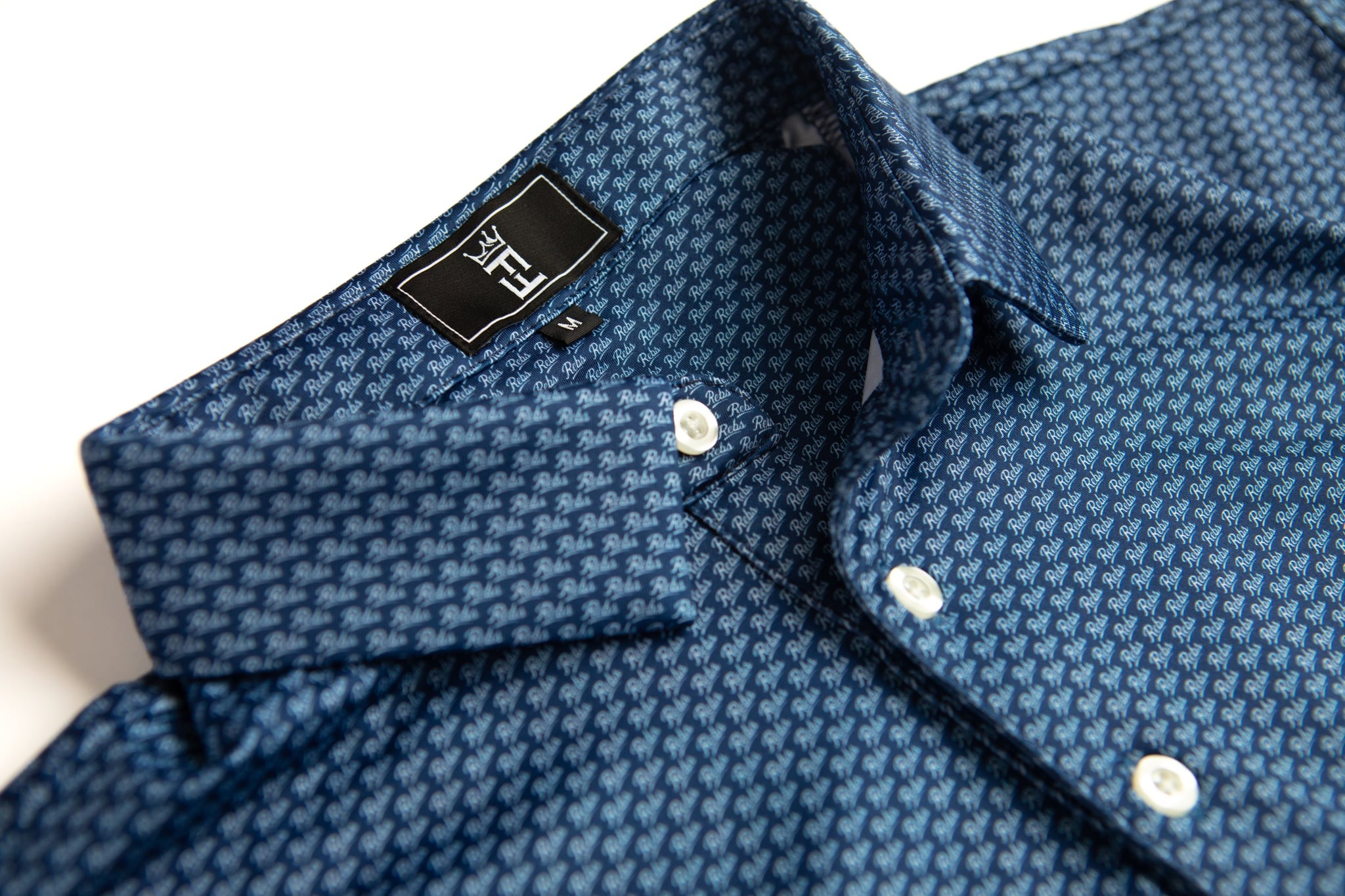 Navy Script polo by Fore Horsemen, placket